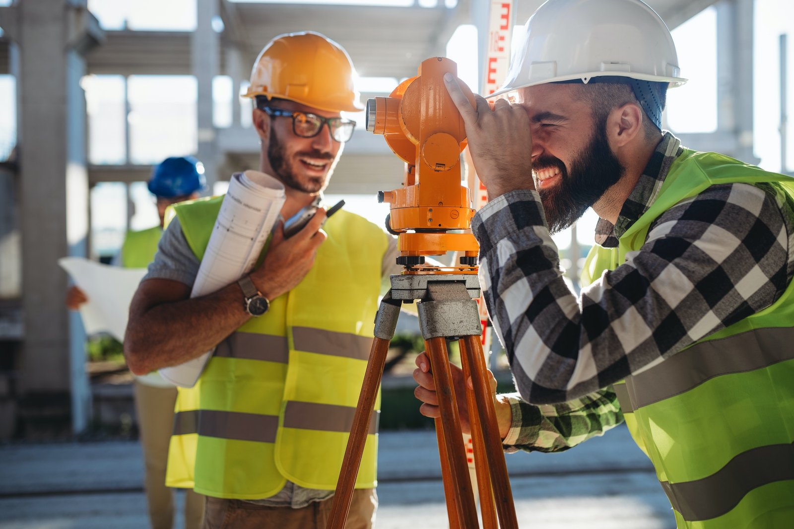 engineer-surveyor-working-with-theodolite-at-construction-site.jpg